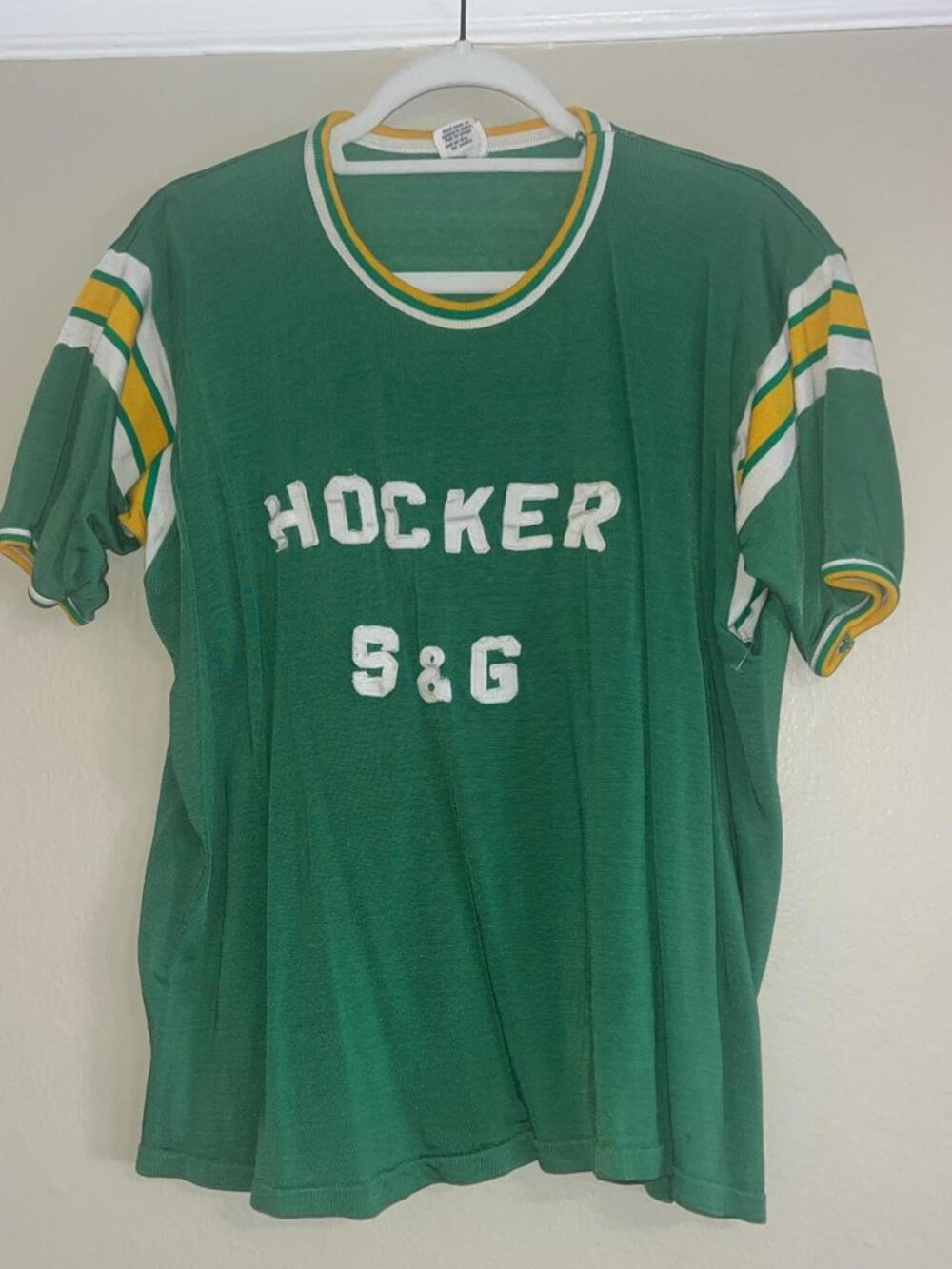 Vintage Green Sports Jersey with Yellow and White Stripes